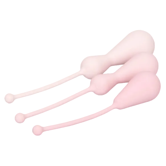 Pink silicone tool on a white background
