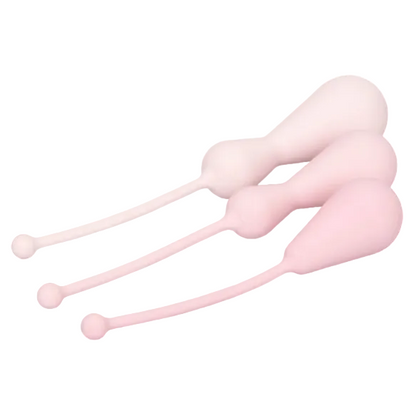 Pink silicone tool on a white background
