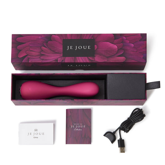 Pink electronic massager in a decorative box with 'JE JOUE' branding, including a USB cable and packaging on a white background.