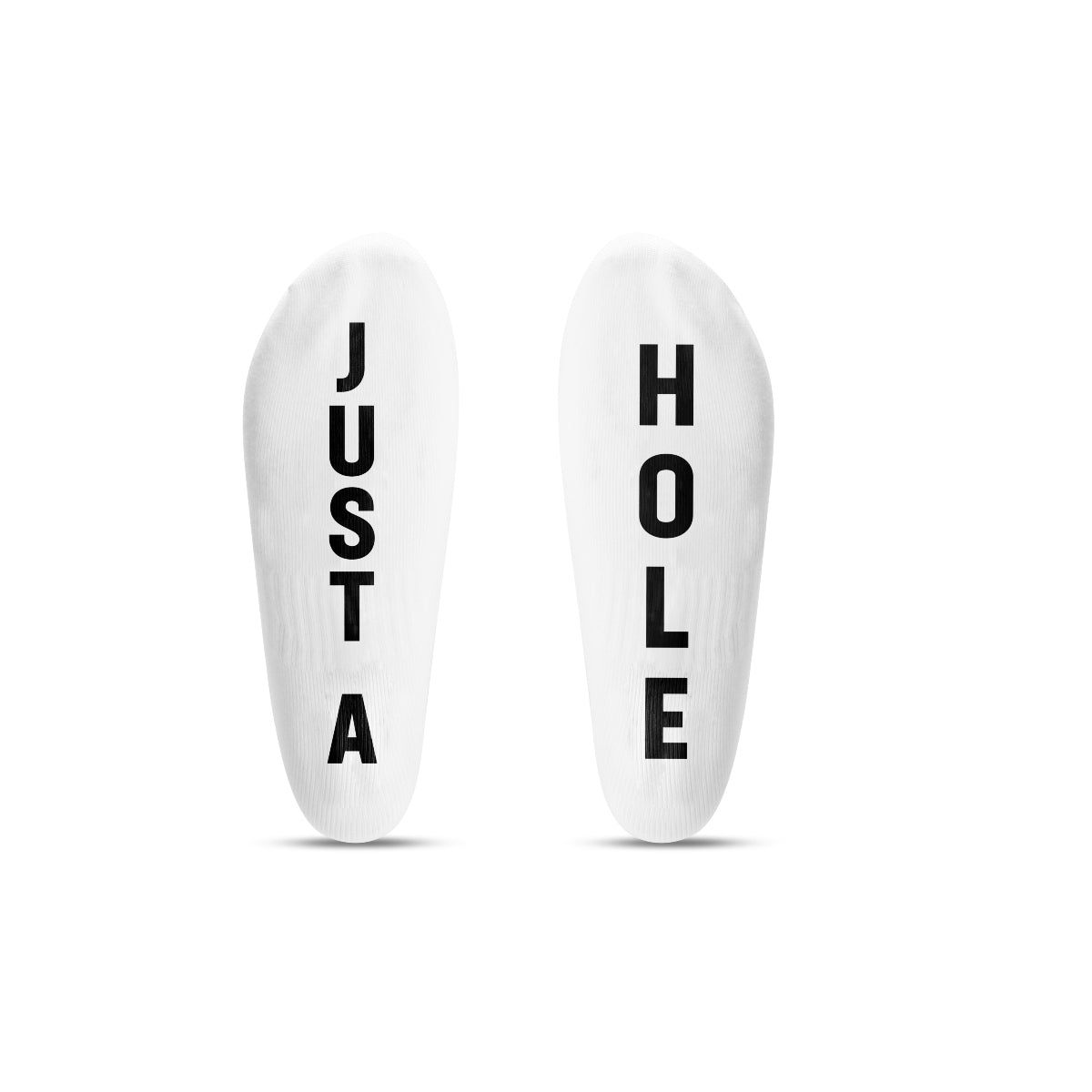 Two white socks with text 'JUST A' and 'HOLE' on a white background