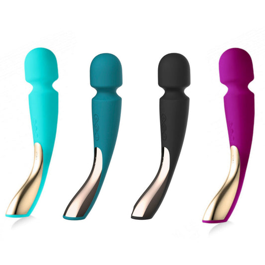 Four colorful massage tools with gold accents on a white background