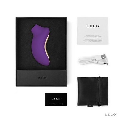 LELO product packaging with purple device, black box, USB cable, and pouch on a white background.