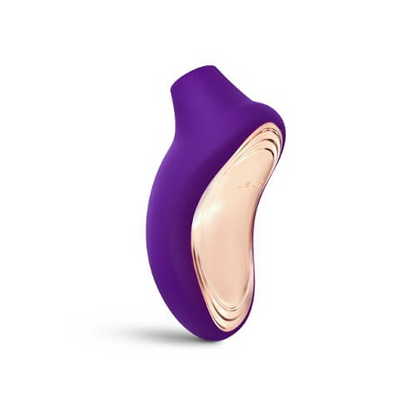 Purple and rose gold massager on a white background
