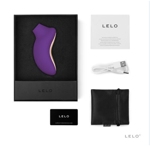 LELO product packaging with purple device, black box, USB cable, and pouch on a white background.