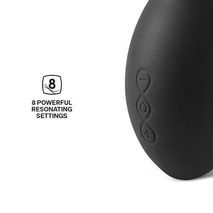 Black electronic device with power symbol on a white background