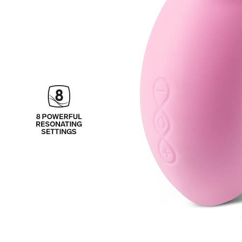 Pink massage ball with '8 Powerful Resonating Settings' text on a white background