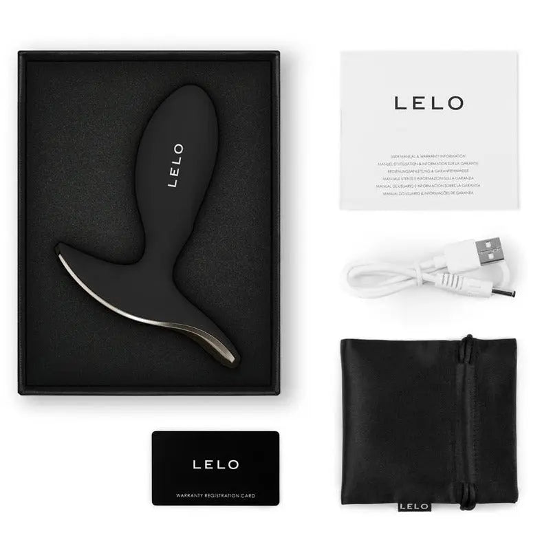 LELO product packaging with black device, USB cable, and pouch on a white background