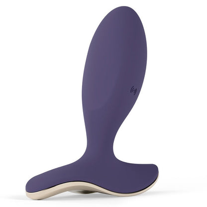 Purple and beige anal plug on a white background
