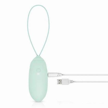 Mint green egg-shaped massage device with a USB cable on a white background
