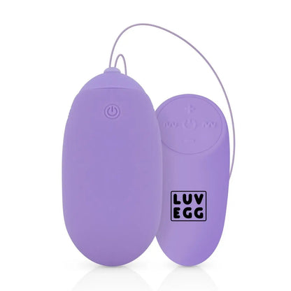 Purple silicone egg-shaped device with a power symbol on a white background