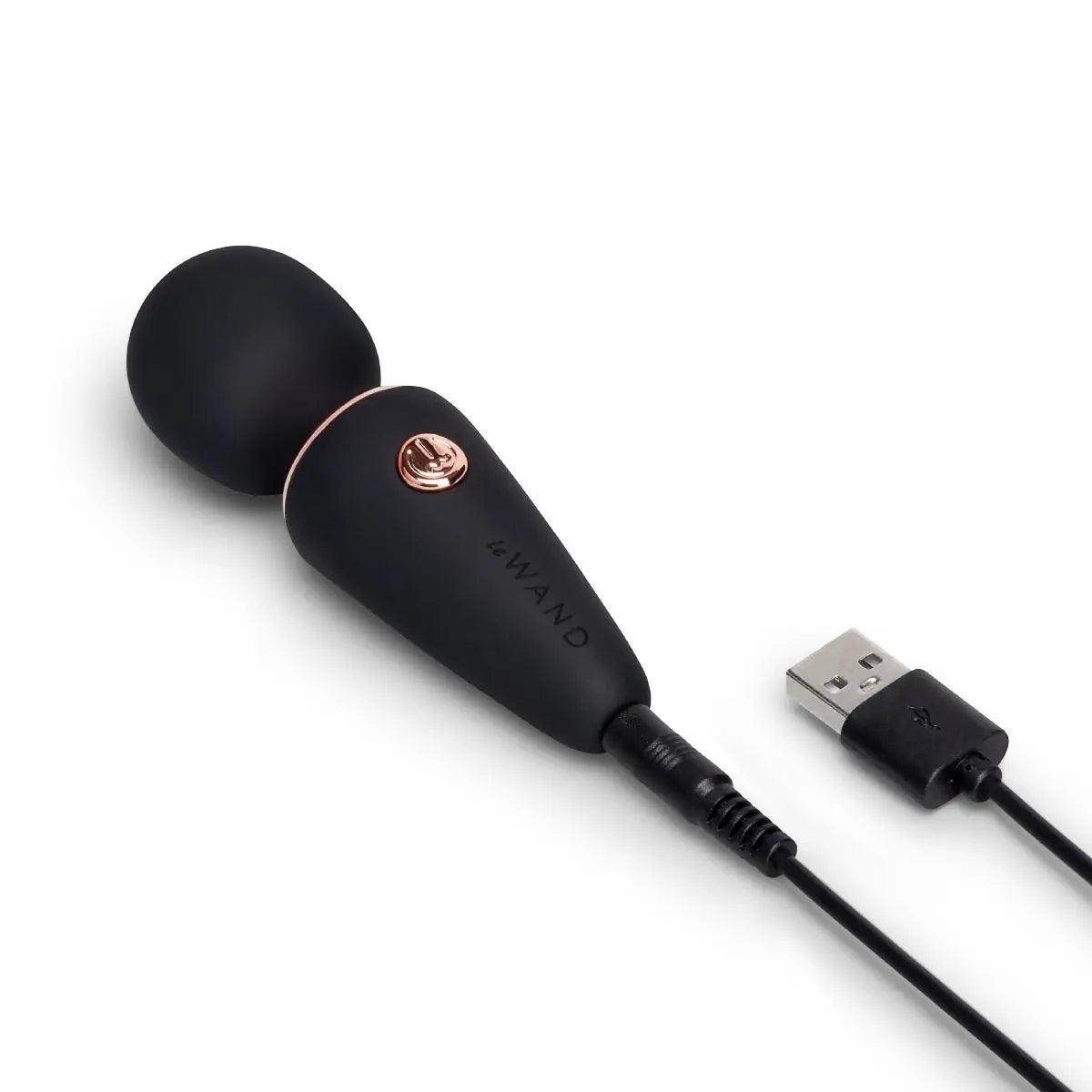Black and rose gold massage device with USB cable on a white background