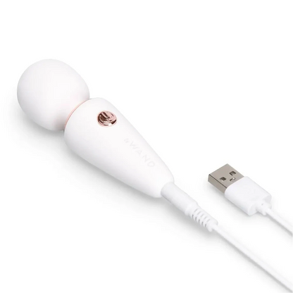 White handheld device with a USB connector on a white background