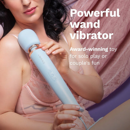 Woman holding a light blue wand vibrator with text about its use and features.