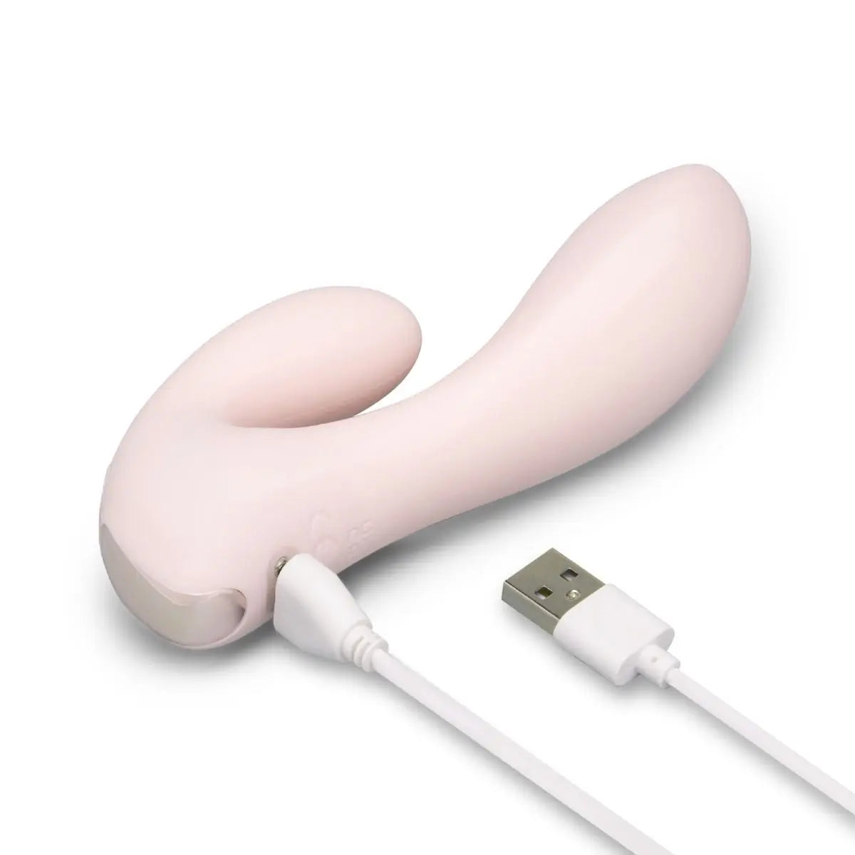 Pink electronic massage device with USB cable on a white background