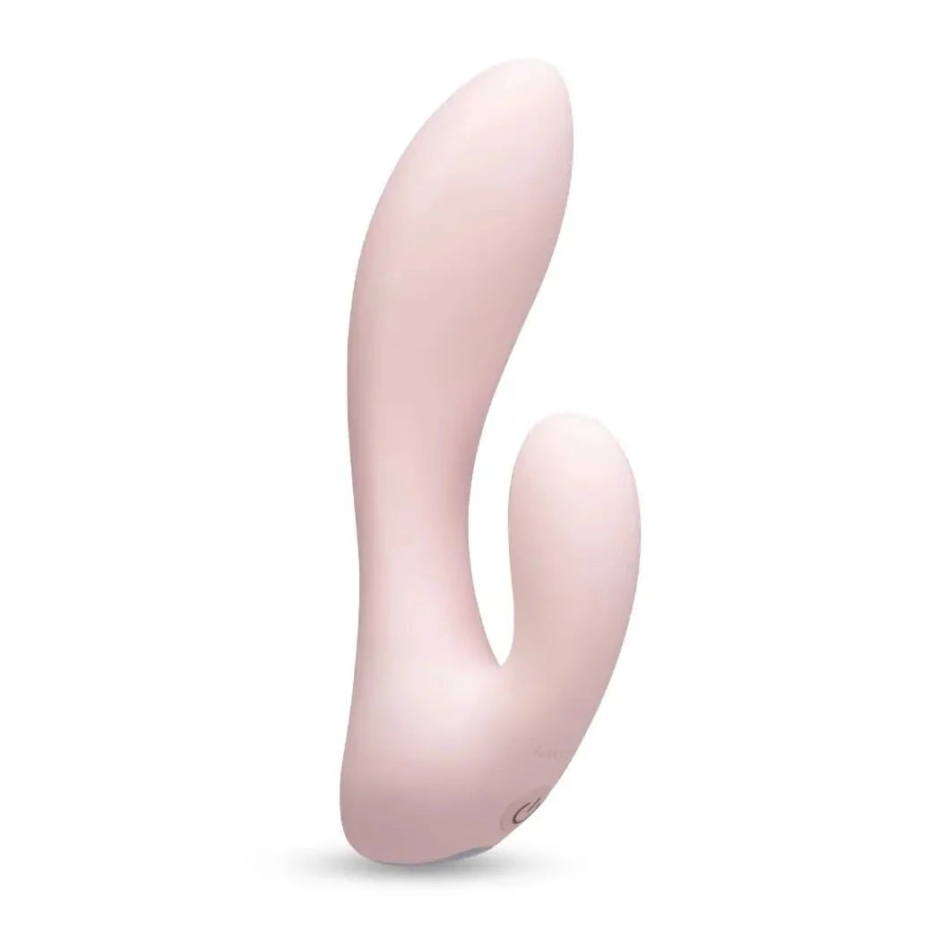 Pink curved vibrator on a white background