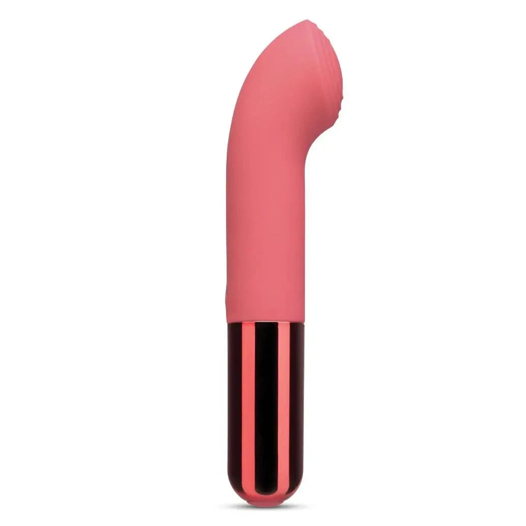 Pink massage device on a white background
