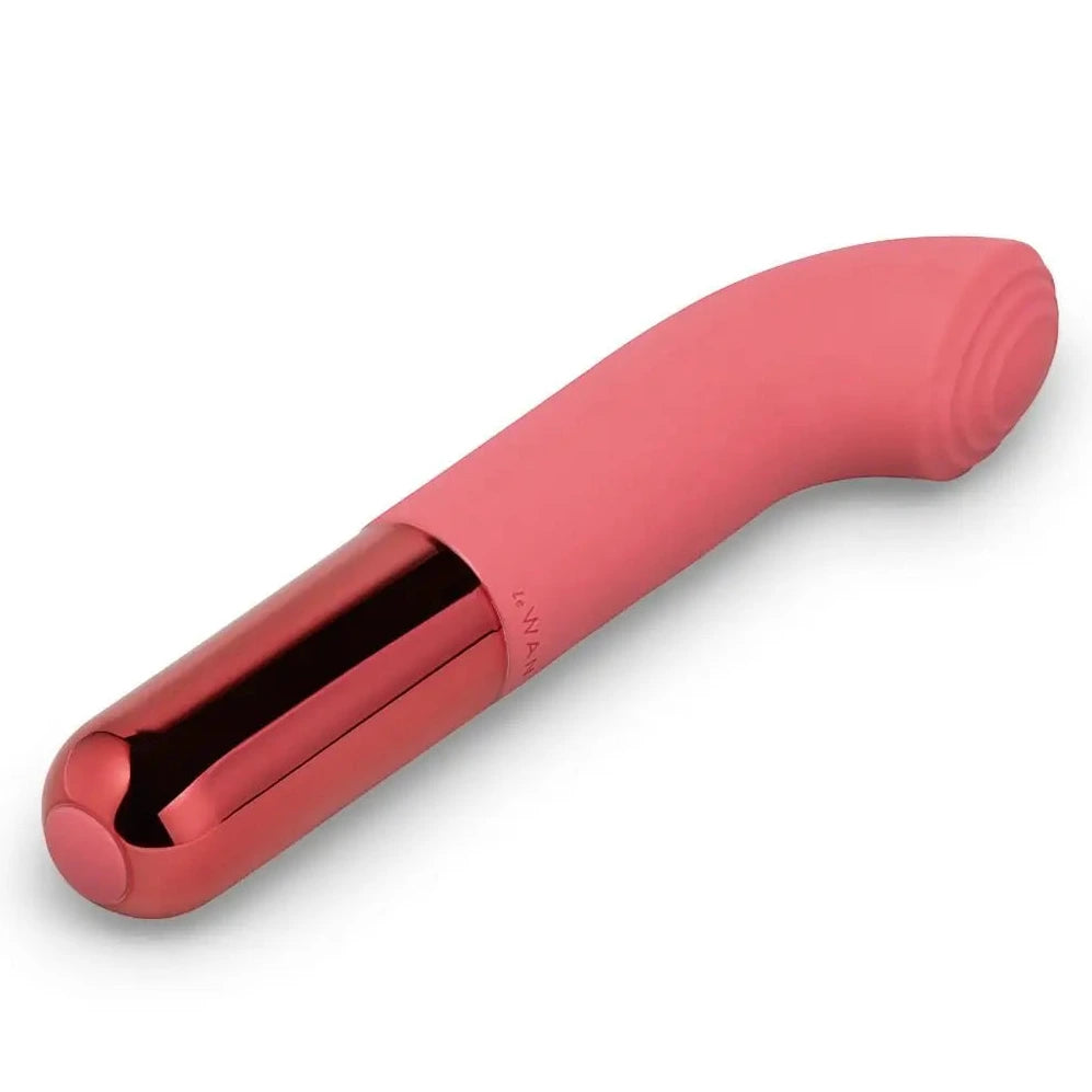 Pink and red G-spot massage device on a white background
