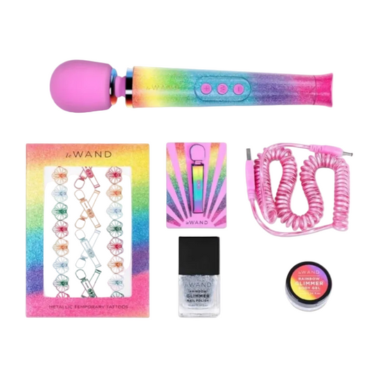 Colorful wand massager with accessories including temporary tattoos, nail polish, and a coiled pink cord on a white background.