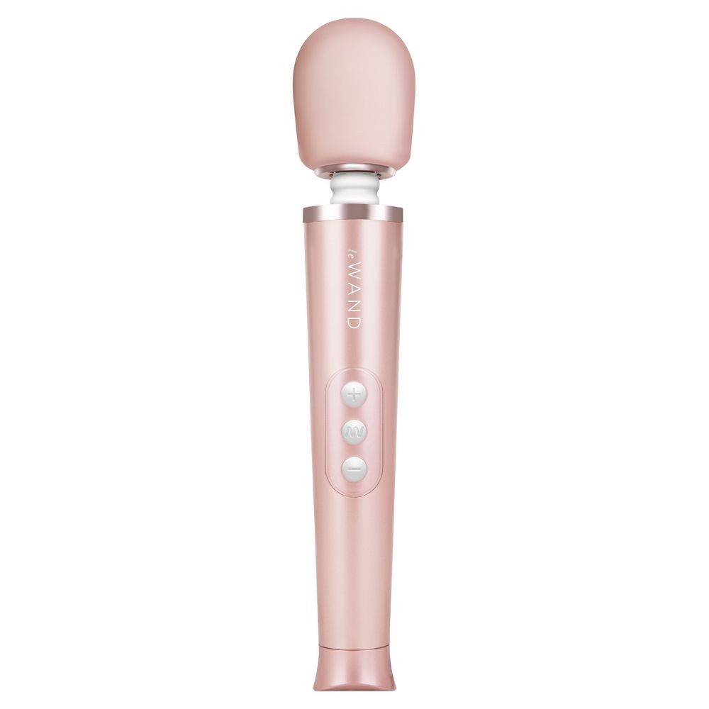 Pink handheld device with 'Le WAND' branding on a white background