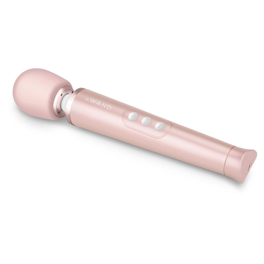 Pink handheld electronic device on a white background