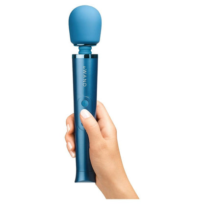 Blue 'Le WAND' device held in a hand against a white background