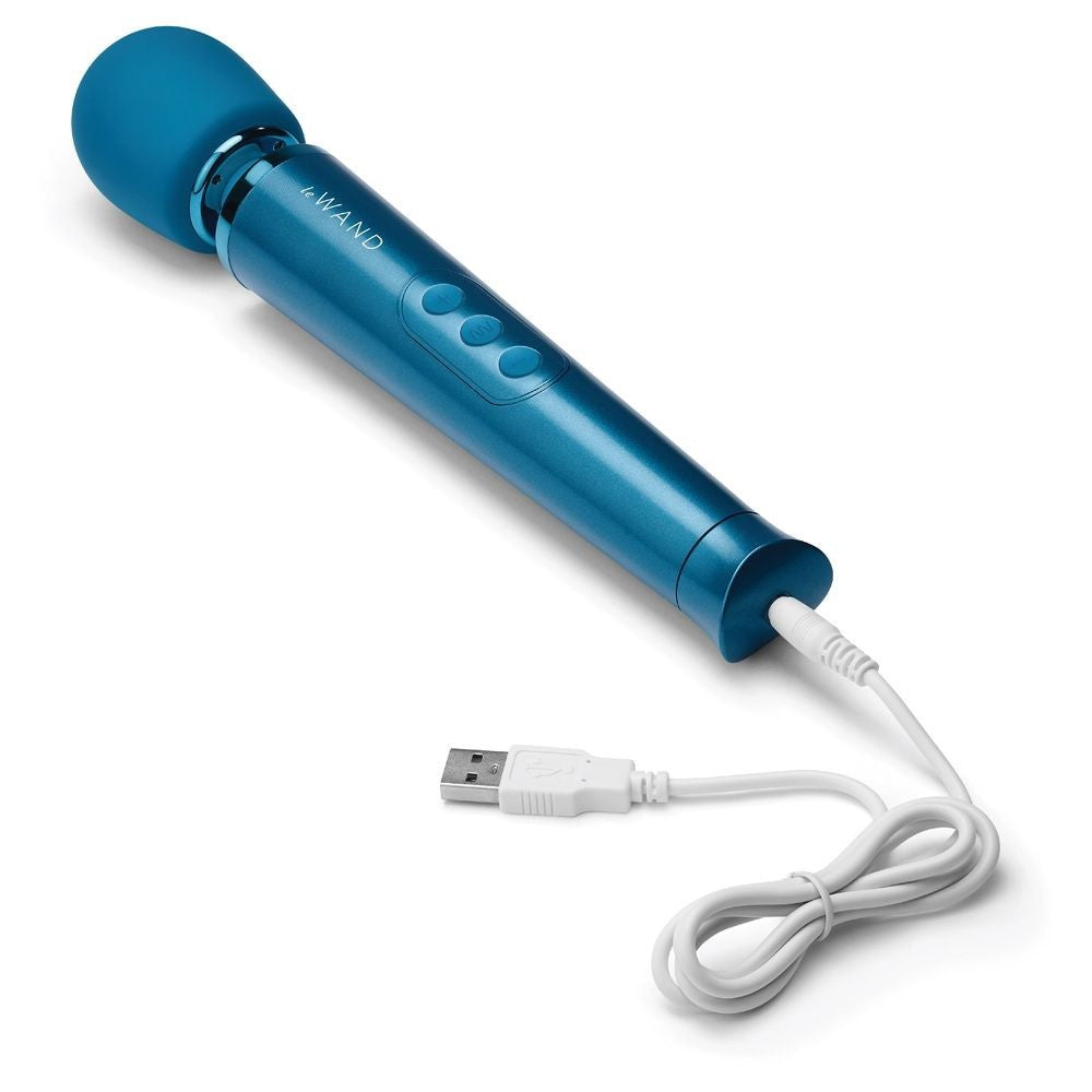 Blue handheld massager with USB cable on a white background