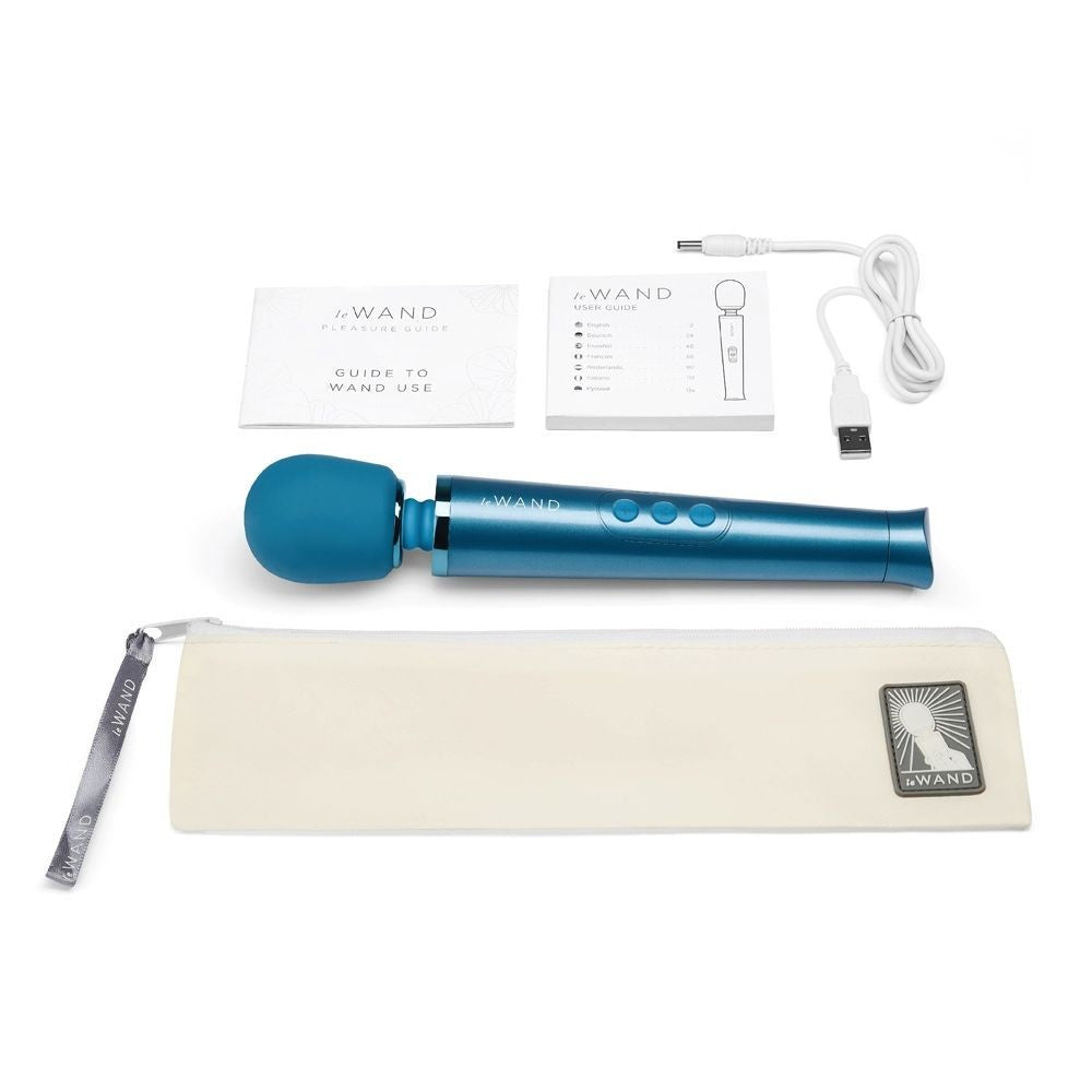 Blue handheld device with packaging, user guide, and USB cable on a white background