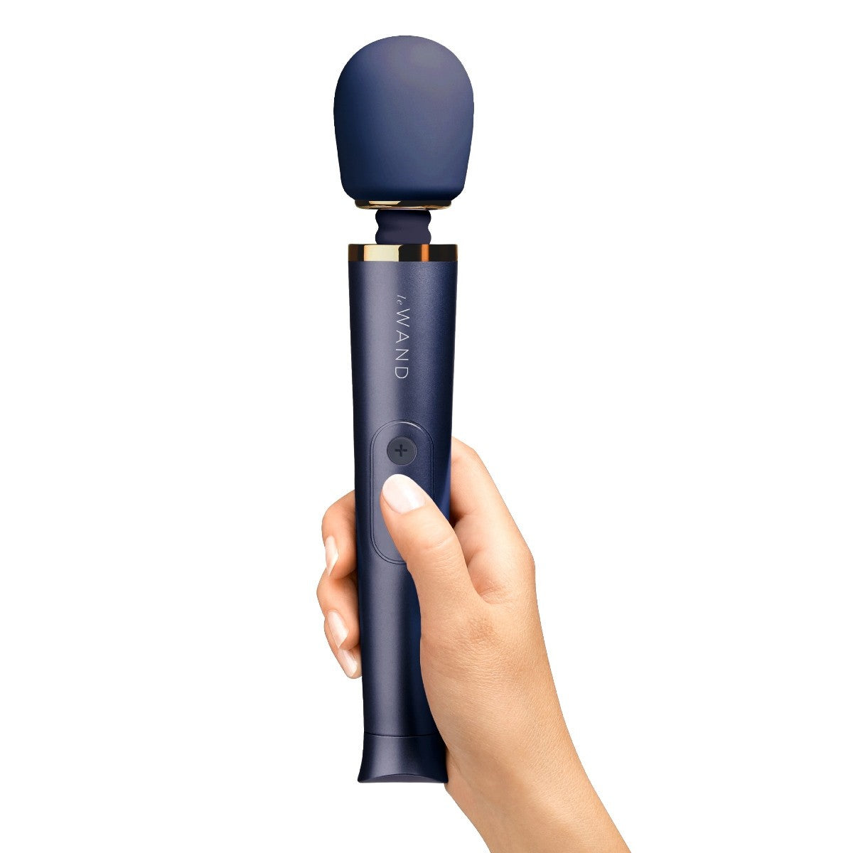 Hand holding a blue handheld device with 'Le WAND' branding on a white background