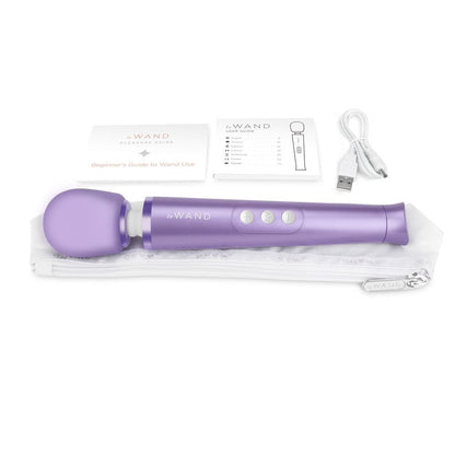 Purple handheld vibrator with packaging on a white background