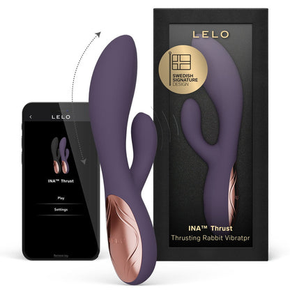 Purple and rose gold Lelo INA Thrust thrusting rabbit vibrator with packaging and smartphone displaying product app.