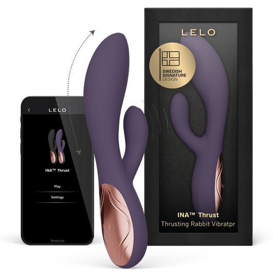 Purple and rose gold Lelo INA Thrust thrusting rabbit vibrator with packaging and smartphone displaying product app.