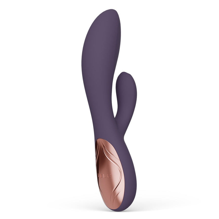 Purple and rose gold Lelo Rabbit Massager device on a white background