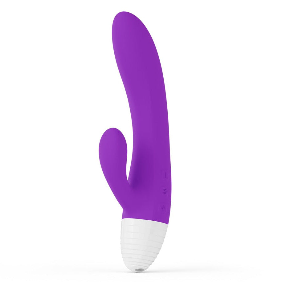 Purple and white rabbit massage device on a white background