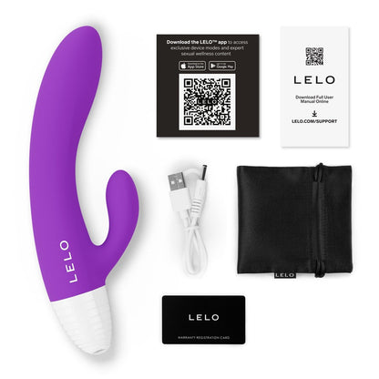 Purple and white Lelo massage rabbit vibrator device with accessories on a white background