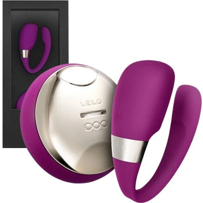 Purple and silver LELO product with packaging on a white background