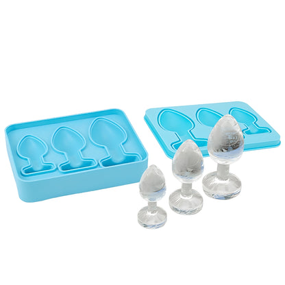 Blue silicone ice cube tray with clear silicone ice molds on a white background