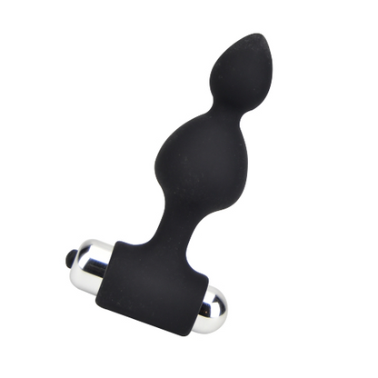 Black and silver silicone butt plug on a white background