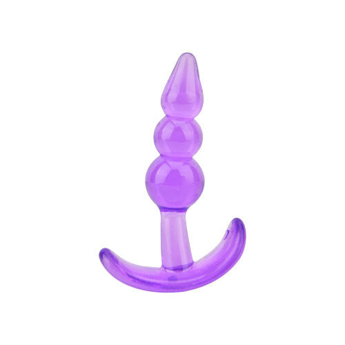 Purple plastic curved object on a white background