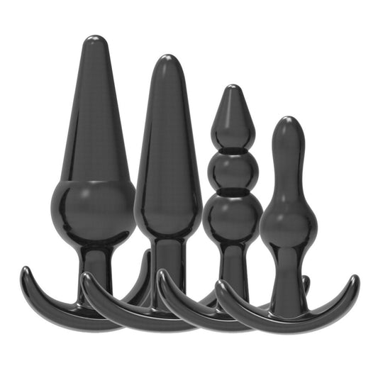 Set of black silicone butt plugs on a white background