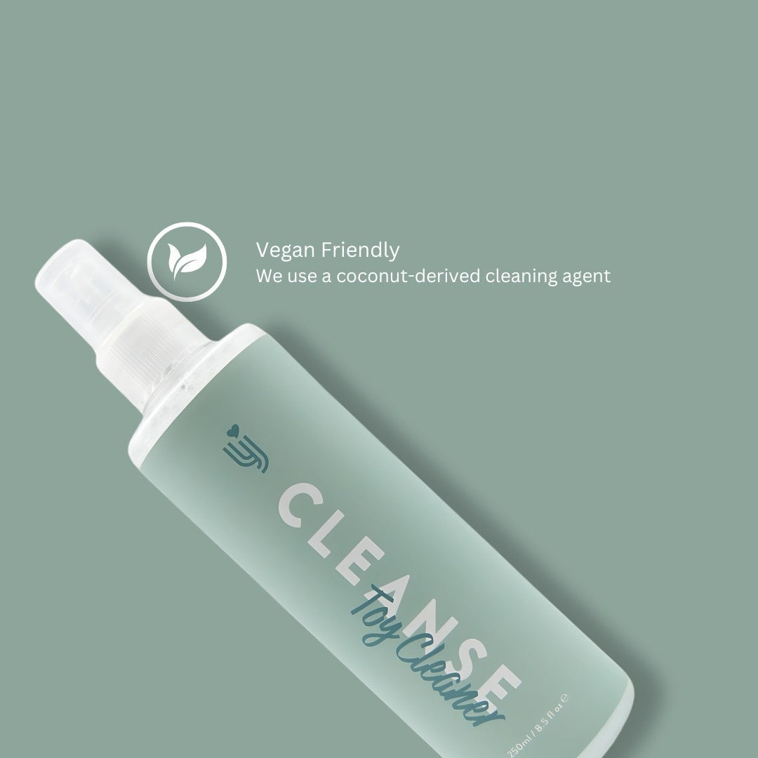 Bottle of CLEANSE toy cleaner with a coconut-derived cleaning agent label on a green background