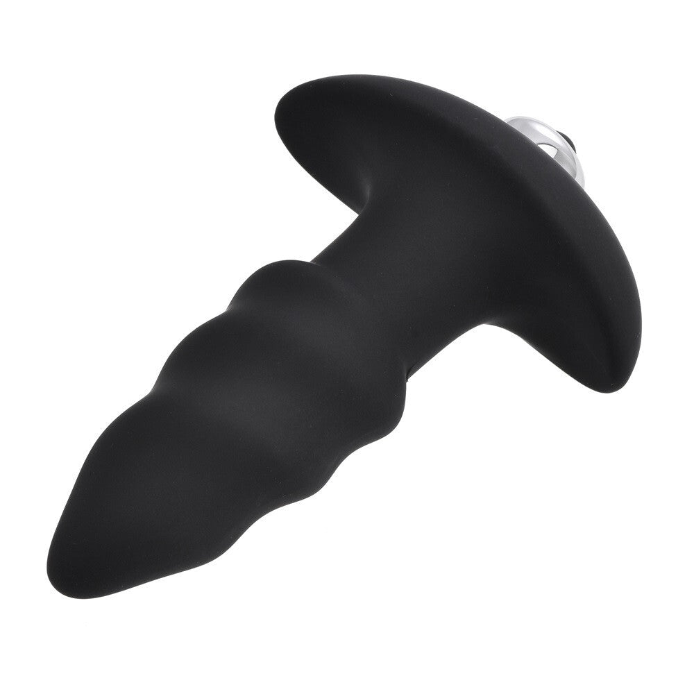 Black silicone butt plug on a white background