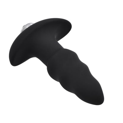 Black silicone butt plug on a white background