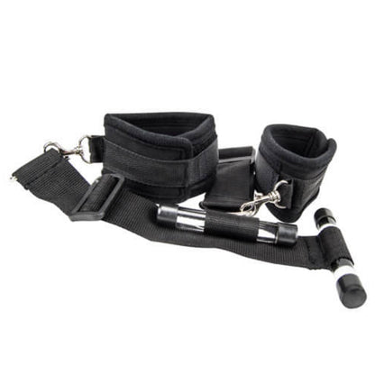 Black restraint set with straps and cuffs on a white background