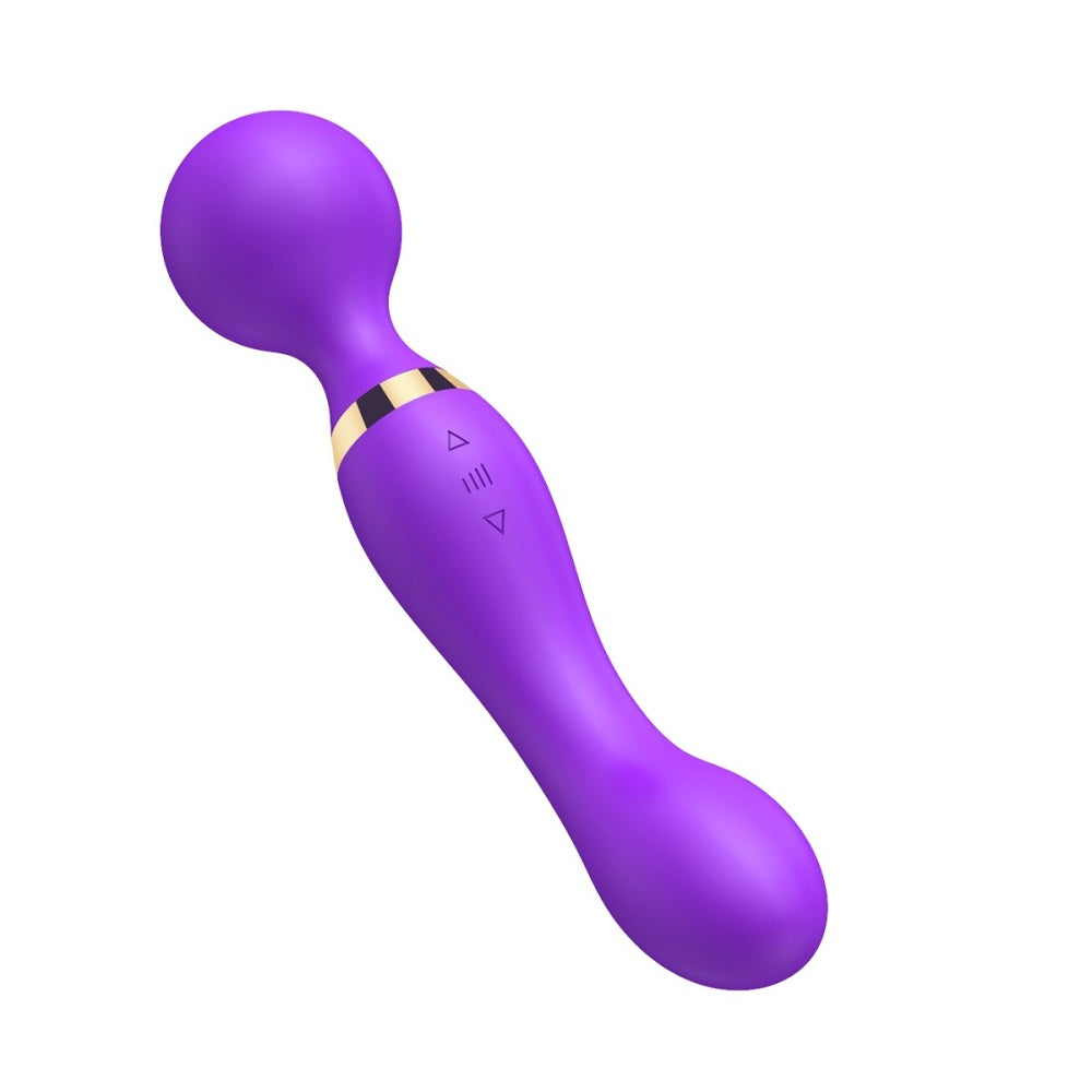 Purple handheld massager on a white background