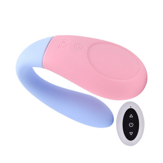 Pink and blue silicone vibrator with remote control on a white background