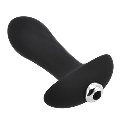 Black silicone butt plug with a silver ring on a white background