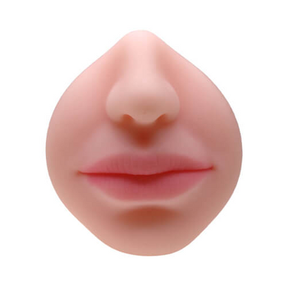 Close-up of a silicone nose and lips on a white background