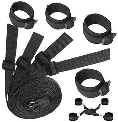 Set of black bondage straps on a white background