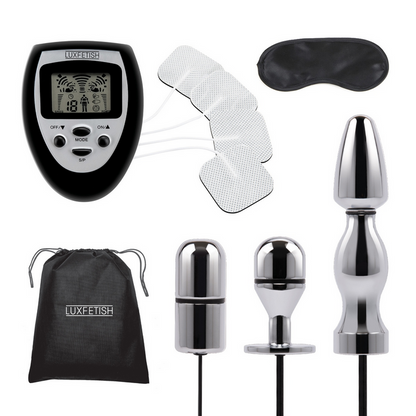 Collection of electronic devices and accessories with a digital display and various components on a white background.