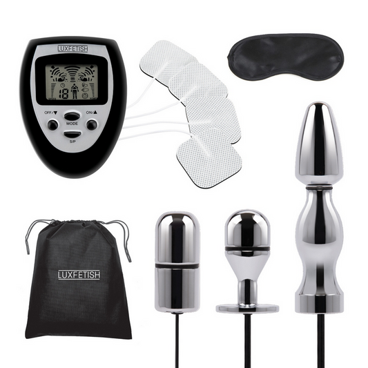 Collection of electronic devices and accessories with a digital display and various components on a white background.